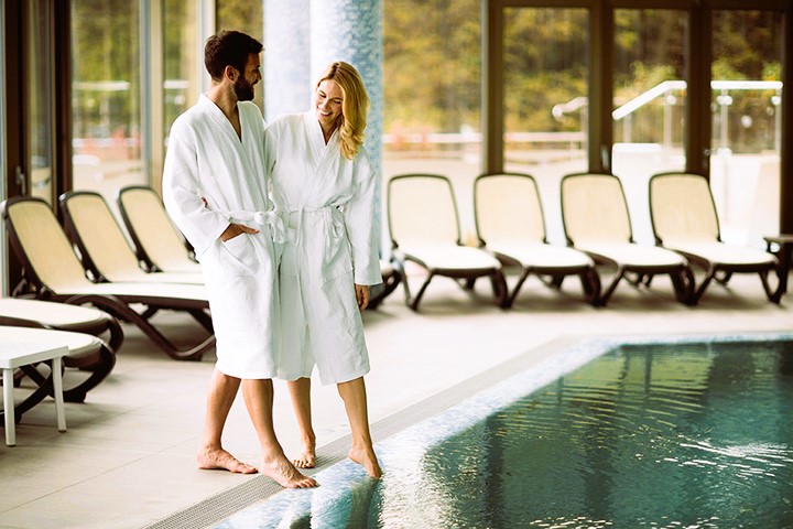 Boy and girl by the pool
